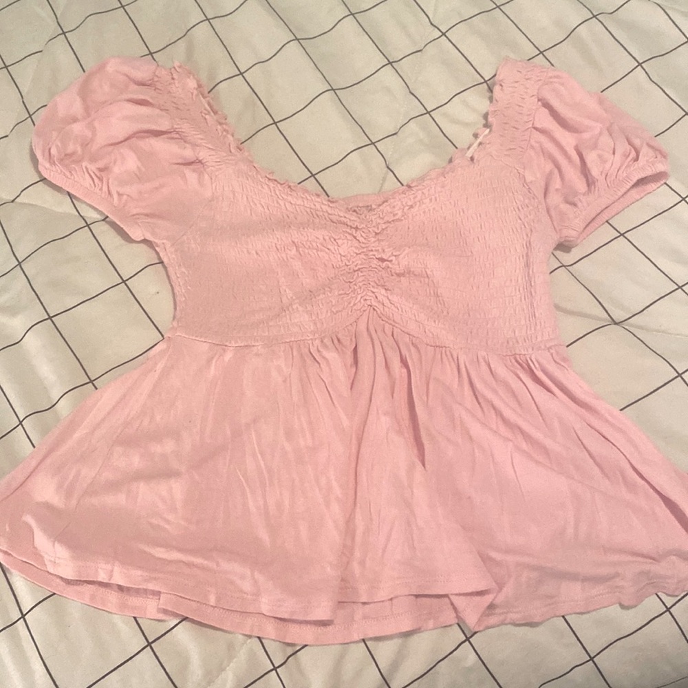 Pink dressy shirt.